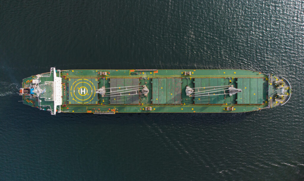 Large general cargo ship tanker bulk carrier, Top down aerial view.